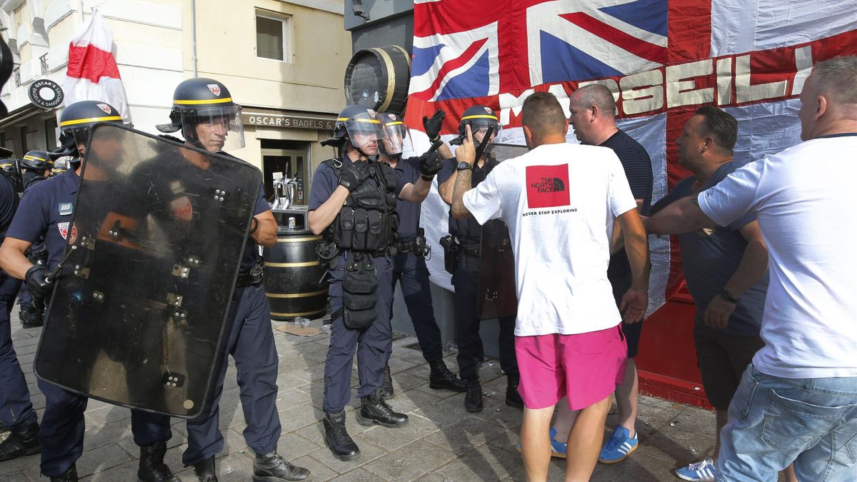 England fans confront riot police ahead of England's EURO 2016 match in Marseille, France, June 10, 2016.