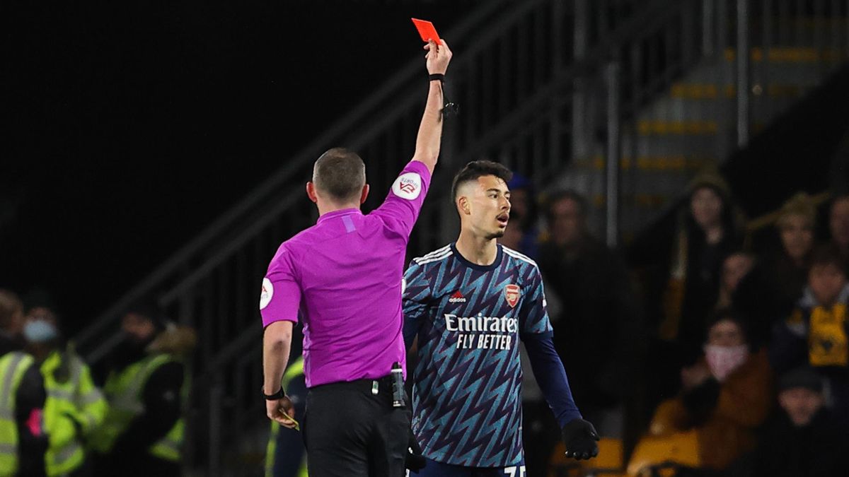Gabriel Martinelli of Arsenal is shown a Red Card by match referee Michael Oliver during the Premier League match between Wolverhampton Wanderers and Arsenal at Molineux on February 10, 2022 in Wolverhampton, United Kingdom. (Photo by James Williamson)