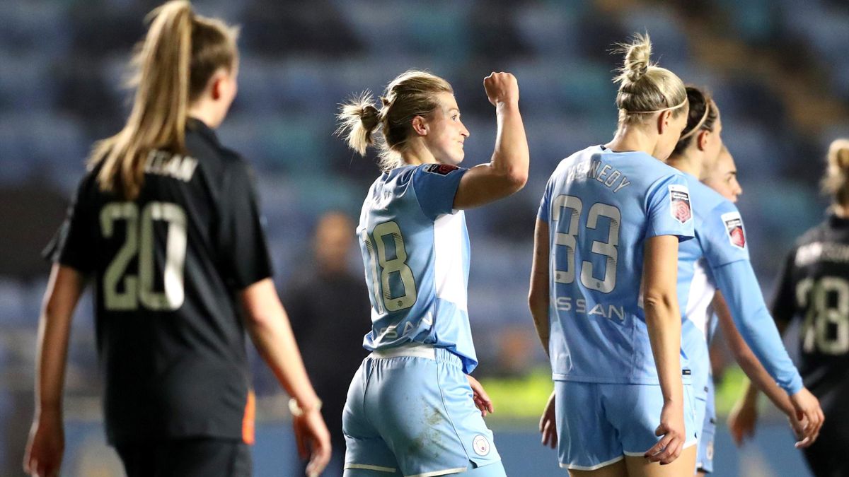 Ellen White of Manchester City (C) celebrates after scoring their team's second goal during the Barclays FA Women's Super League match between Manchester City Women and Everton Women at The Academy Stadium on March 23, 2022