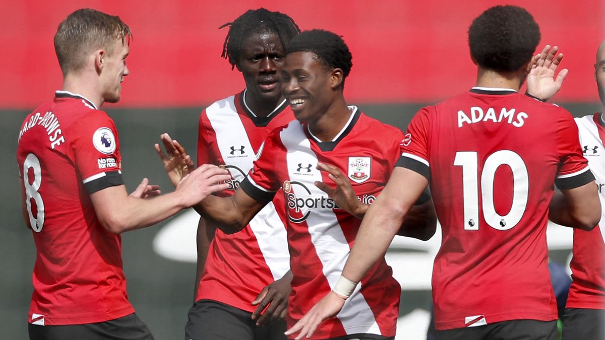 Southampton's English midfielder Nathan Tella (C) celebrates scoring his team's second goal with his teammates during the English Premier League football match between Southampton and Fulham at St Mary's Stadium in Southampton