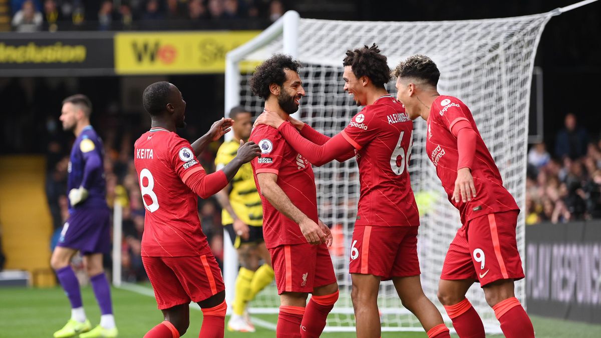 WATFORD, ENGLAND - OCTOBER 16: Mohamed Salah of Liverpool celebrates with teammates Naby Keita, Trent Alexander-Arnold and Roberto Firmino after scoring their side's fourth goal during the Premier League match between Watford and Liverpool at Vicarage Roa
