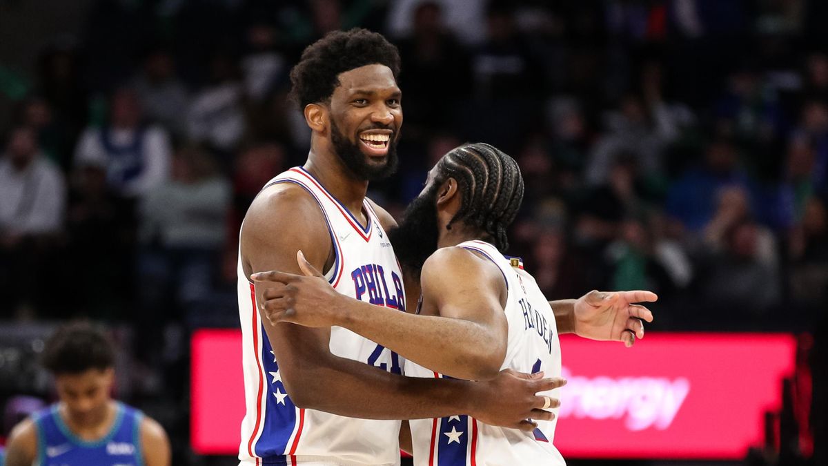 MINNEAPOLIS, MN - FEBRUARY 25: Joel Embiid #21 and James Harden #1 of the Philadelphia 76ers celebrate after Harden drew a foul against Karl-Anthony Towns #32 of the Minnesota Timberwolves (not pictured) in the fourth quarter of the game at Target Center