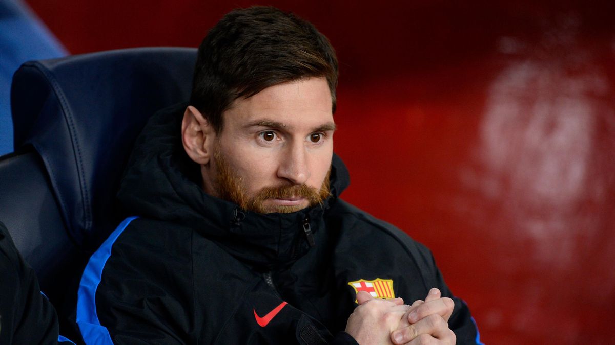 Barcelona's Argentinian forward Lionel Messi sits on the bench during the UEFA Champions League football match FC Barcelona vs Sporting CP at the Camp Nou stadium in Barcelona on December 5, 2017.