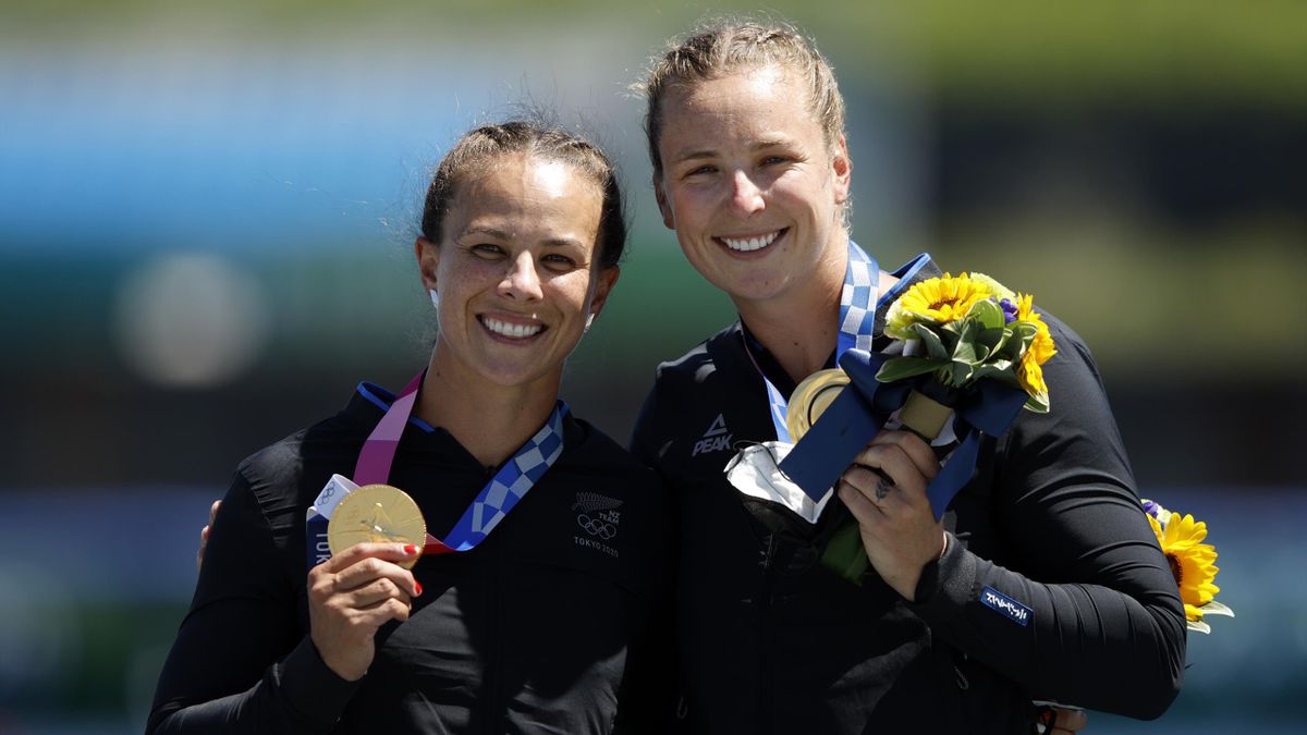 s Lisa Carrington and Caitlin Regal of Team New Zealand celebrate at the medal ceremony for the Women's Kayak Double 500m Final A on day eleven of the Tokyo 2020 Olympic Games at Sea Forest Waterway, Tokyo, August 03, 2021