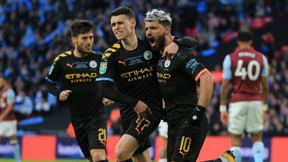Sergio Aguero of Manchester City celebrates with teammate Phil Foden after scoring his team's first goal during the Carabao Cup Final between Aston Villa and Manchester City at Wembley Stadium on March 01, 2020 in London, England