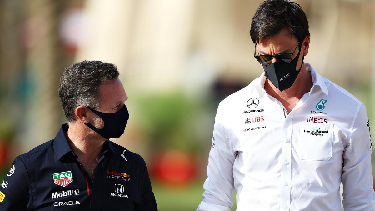 Red Bull Racing Team Principal Christian Horner and Mercedes GP Executive Director Toto Wolff talk in the Paddock during practice ahead of the F1 Grand Prix of Bahrain