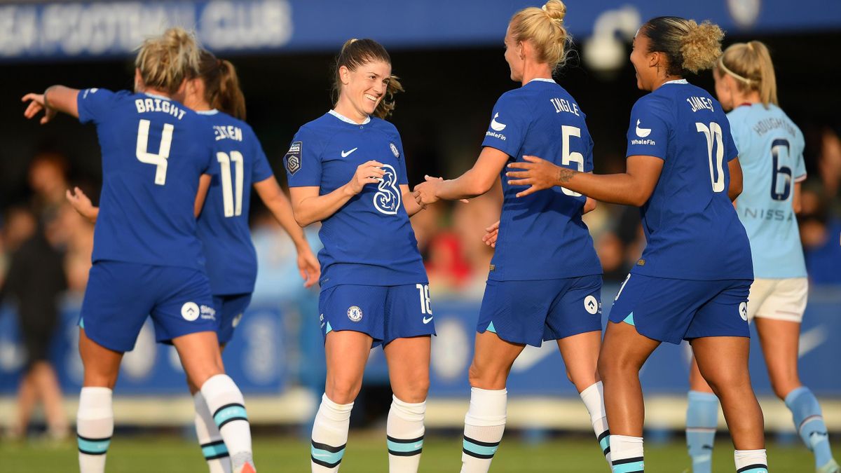 Maren Mjelde of Chelsea celebrates with teammates Sophie Ingle and Lauren James after scoring her team's second goal during the FA Women's Super League match between Chelsea FC Women and Manchester City WFC.