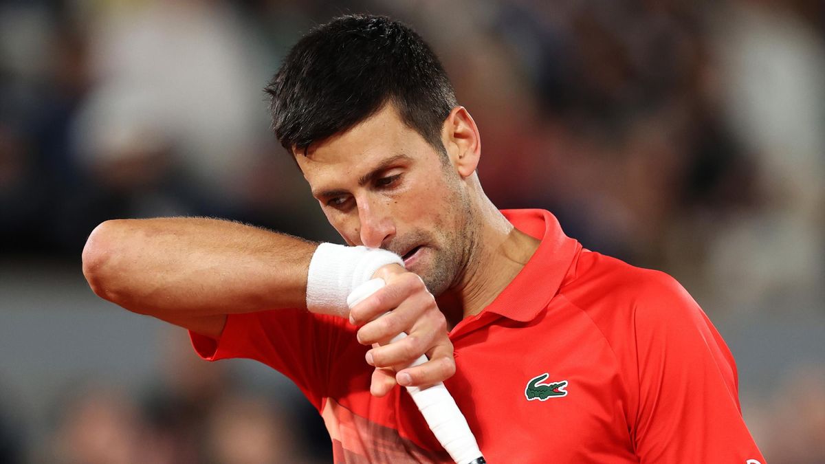 Novak Djokovic of Serbia reacts against Rafael Nadal of Spain during the Men's Singles Quarter Final match on Day 10 of The 2022 French Open at Roland Garros on May 31, 2022 in Paris, France.
