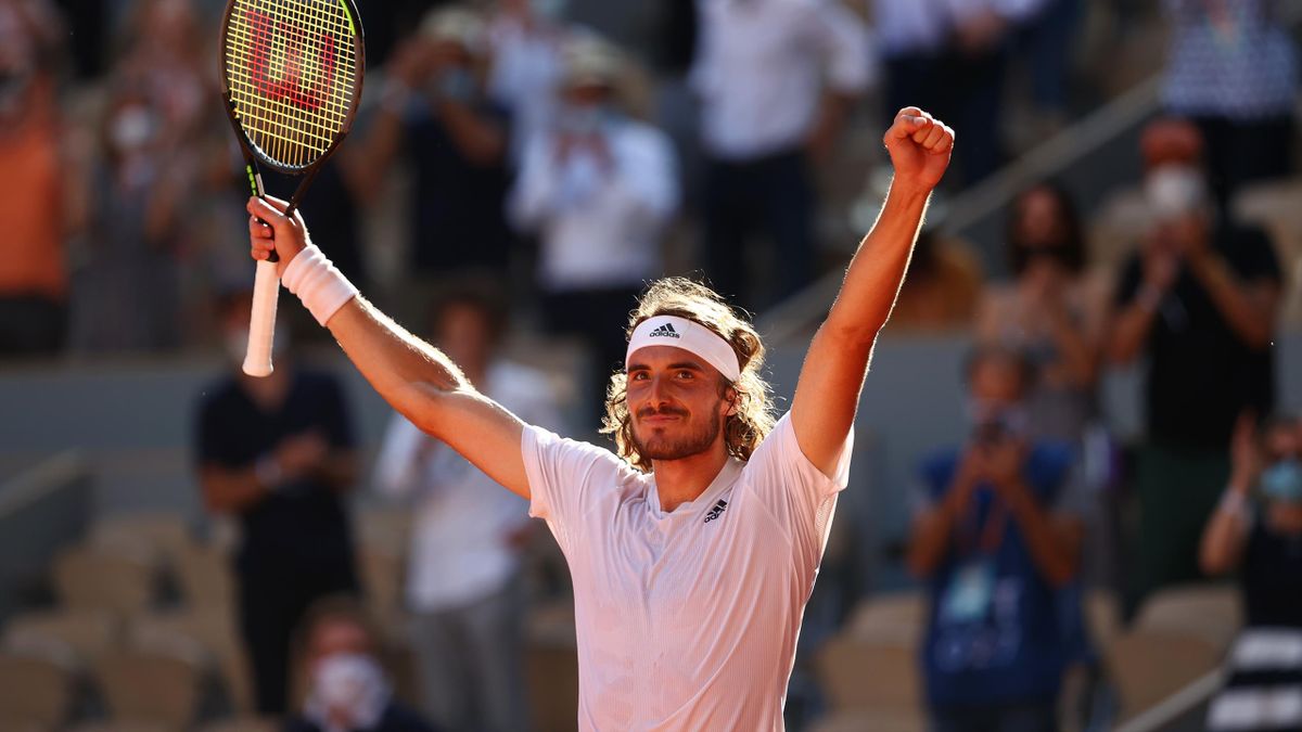 Stefanos Tsitsipas of Greece celebrates after winning match point during his Men's Singles Semi Final match against Alexander Zverev of Germany on day Thirteen of the 2021 French Open at Roland Garros