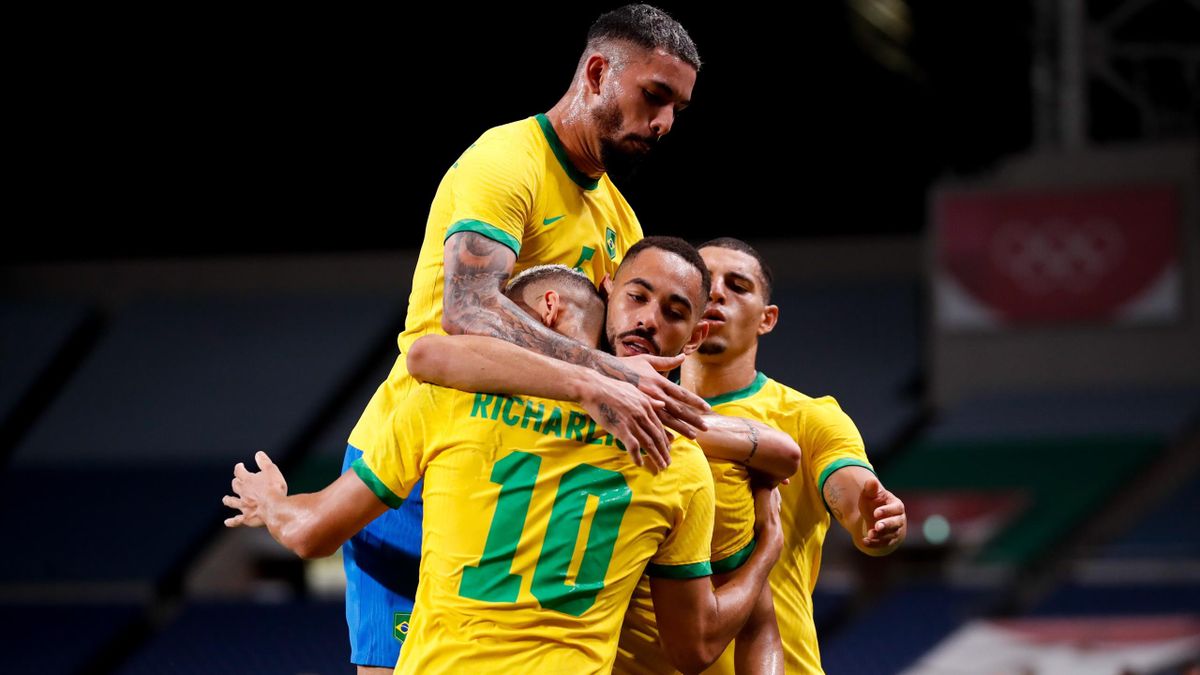 Matheus Cunha #9 of Brazil celebrates his scoring with teammates in the Men's Quarterfinal match between Brazil and Egypt during the Tokyo 2020 Olympic Games at Saitama Stadium on July 31, 2021 in Saitama, Tokyo, Japan