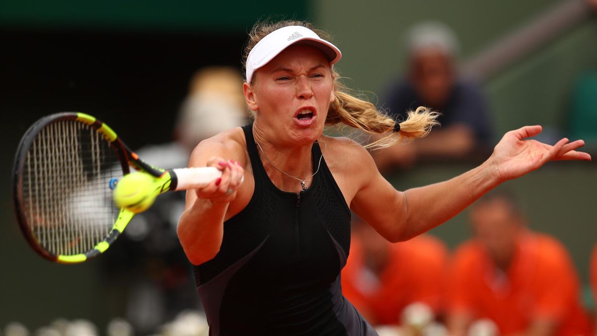 Caroline Wozniacki of Denmark plays a forehand during the ladies singles first round match against Danielle Collins of The United States during day two of the 2018 French Open at Roland Garros on May 28, 2018 in Paris, France
