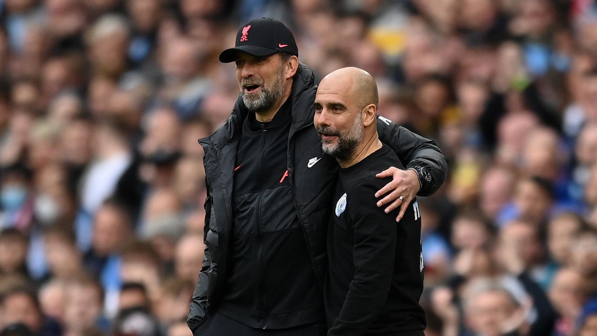 MANCHESTER, ENGLAND - APRIL 10: Pep Guardiola, Manager of Manchester City interacts with Jurgen Klopp, Manager of Liverpool during the Premier League match between Manchester City and Liverpool at Etihad Stadium on April 10, 2022 in Manchester, England. (