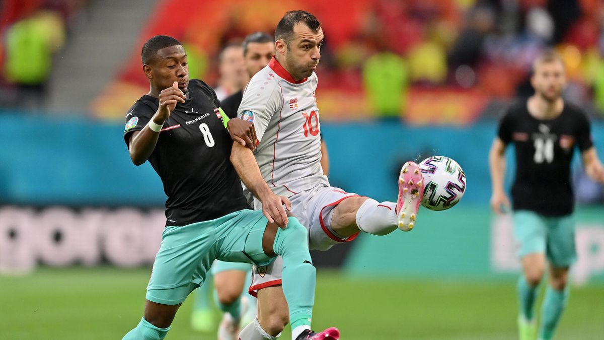 David Alaba of Austria battles for possession with Goran Pandev of North Macedonia during the UEFA Euro 2020 Championship Group C match