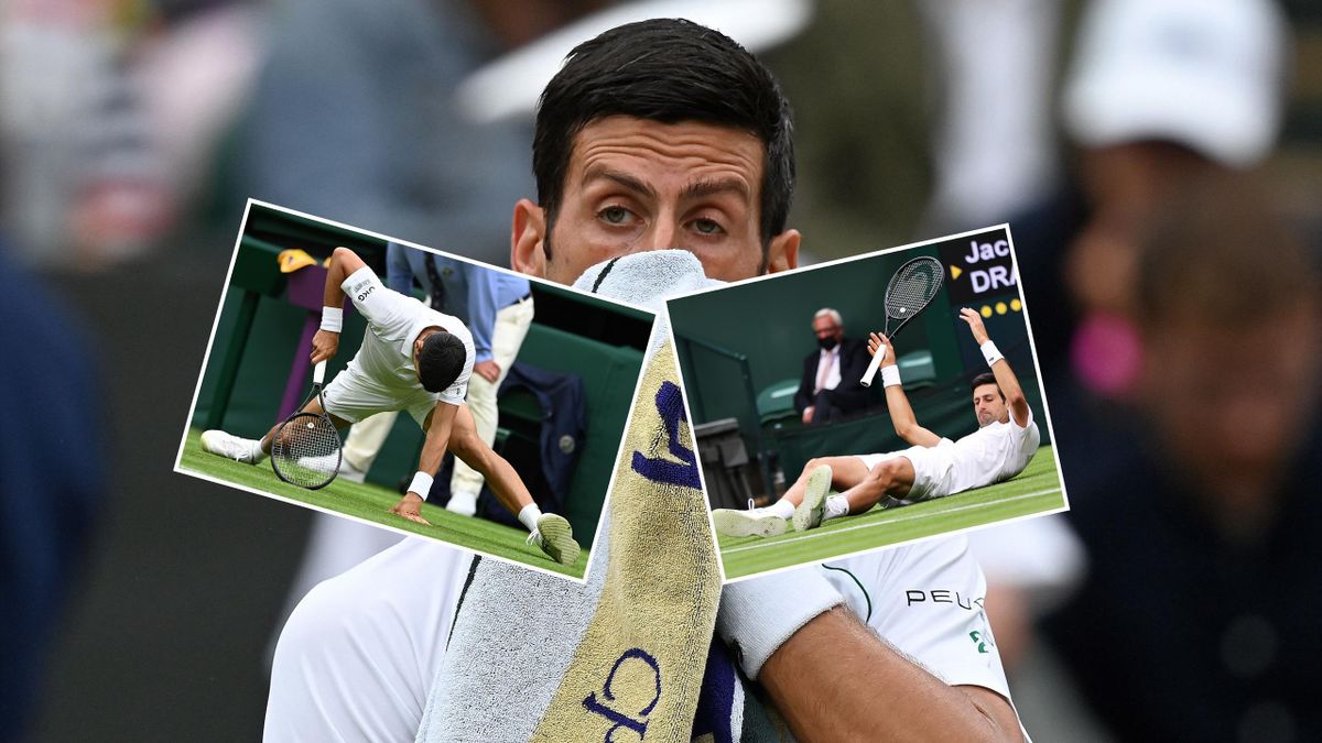 Serbia's Novak Djokovic slips on the grass as she returns against Britain's Jack Draper during their men's singles first round match on the first day of the 2021 Wimbledon Championships at The All England Tennis Club in Wimbledon
