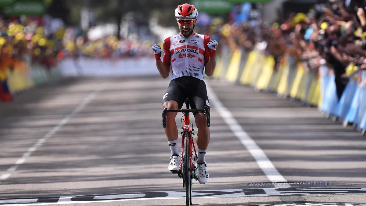 Belgium's Thomas De Gendt celebrates as he wins on the finish line of the eighth stage of the 106th edition of the Tour de France cycling race between Macon and Saint-Etienne, in Saint-Etienne, eastern France, on July 13, 2019