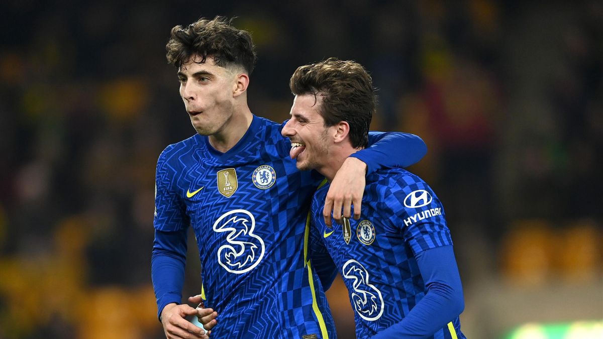 NORWICH, ENGLAND - MARCH 10: Kai Havertz celebrates with Mason Mount of Chelsea after scoring their team's third goal during the Premier League match between Norwich City and Chelsea at Carrow Road on March 10, 2022 in Norwich, England. (Photo by Darren W