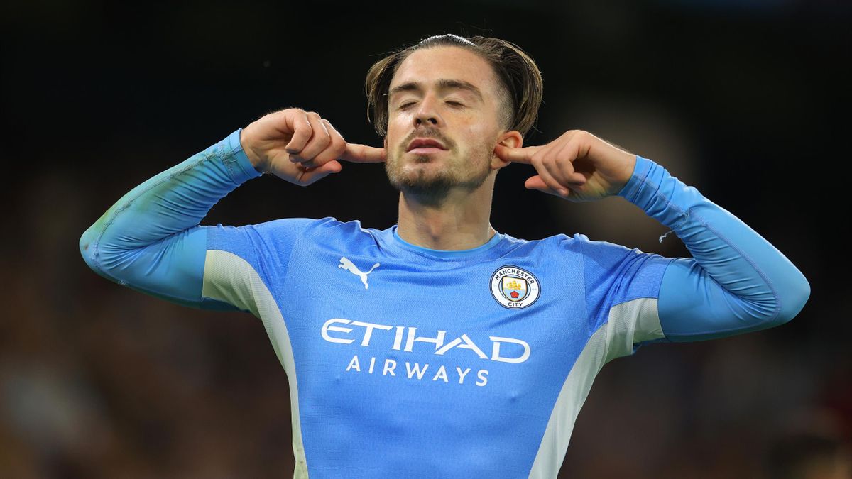 Jack Grealish of Manchester City celebrates after scoring their fourth goal during the UEFA Champions League group A match between Manchester City and RB Leipzig at Etihad Stadium on September 15, 2021 in Manchester, England