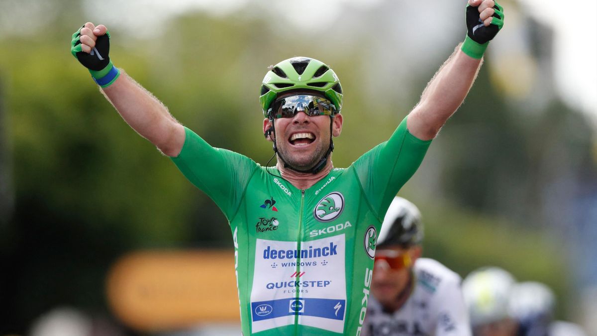 Team Deceuninck Quickstep's Mark Cavendish of Great Britain celebrates as he crosses the finish line of the 6th stage of the 108th edition of the Tour de France cycling race, 160 km between Tours and Chateauroux