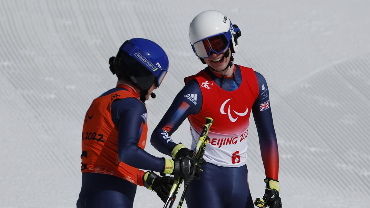 Team GB's Neil Simpson celebrates gold with guide and brother Andrew Simpson in the para alpine skiing men's super-G vision impaired