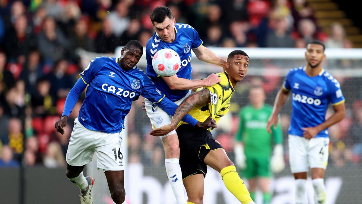 Abdoulaye Doucoure and Michael Keane of Everton challenge Joao Pedro of Watford during the Premier League match between Watford and Everton at Vicarage Road on May 11, 2022 in Watford, United Kingdom. (Photo by Charlotte Wilson/Offside/Offside via Getty I