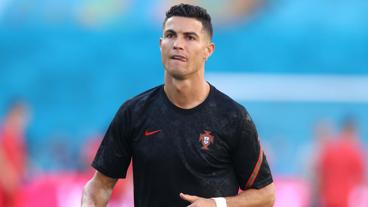 Cristiano Ronaldo of Portugal looks on as he warms up prior to the UEFA Euro 2020 Championship Round of 16 match between Belgium and Portugal