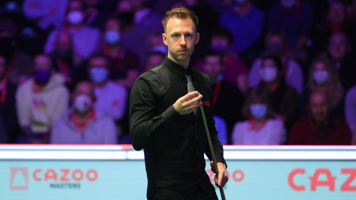 Judd Trump in Masters first round action against Mark Allen and Alexandra Palace, London