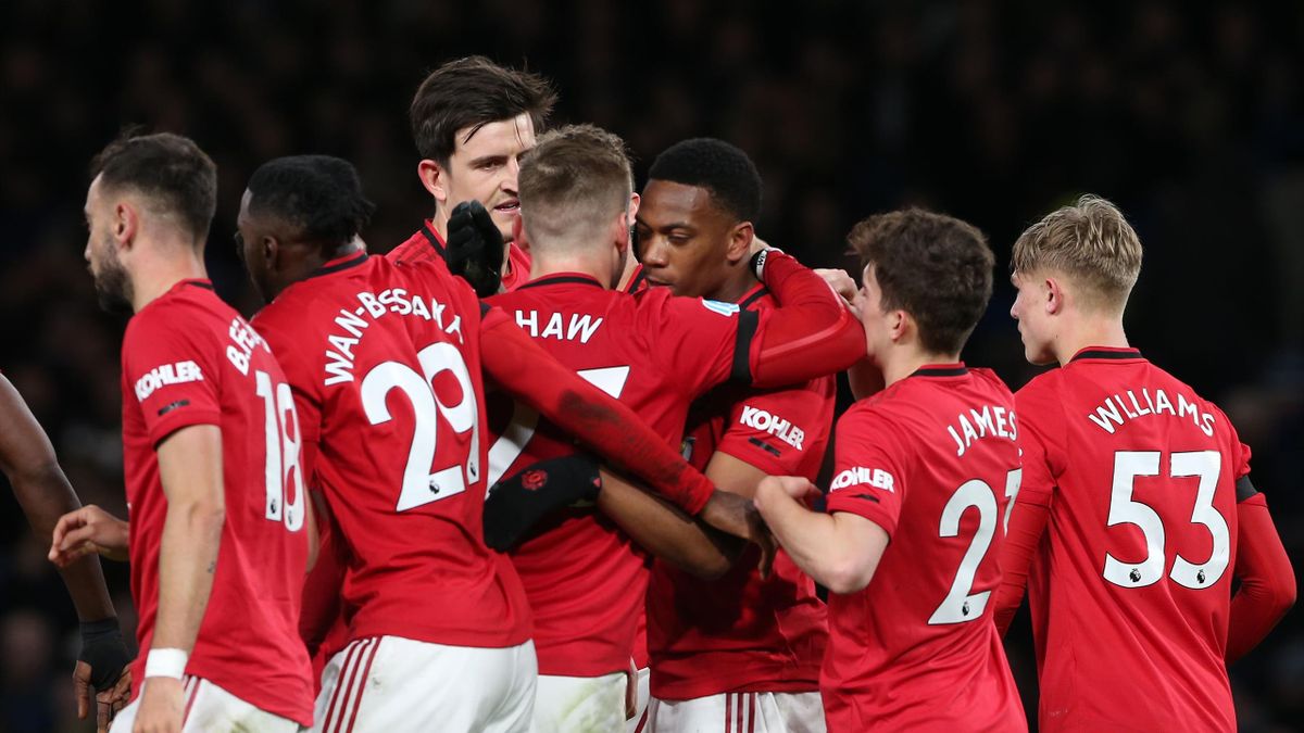Les joueurs de Manchester United célèbrent l'ouverture du score d'Anthony Martial lors de Chelsea-Manchester United / Premier League