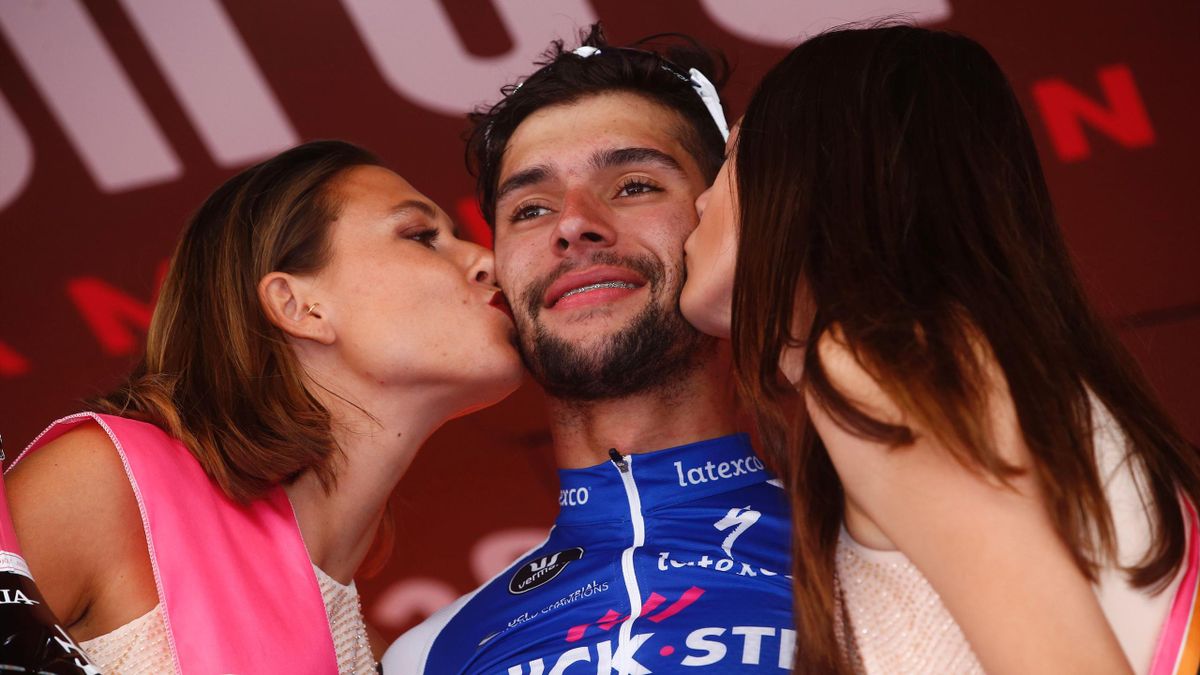 Colombia's Fernando Gaviria of team Quick-Step celebrates on the podium after winning the third stage of the 100th Giro d'Italia, Tour of Italy, cycling race from Tortoli to Cagliari on May 7, 2017 in Sardinia. Colombian sprinter Fernando Gaviria finished