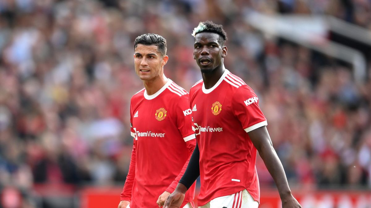 Cristiano Ronaldo and Paul Pogba of Manchester United look on during the Premier League match between Manchester United and Newcastle United at Old Trafford on September 11, 2021 in Manchester, England.