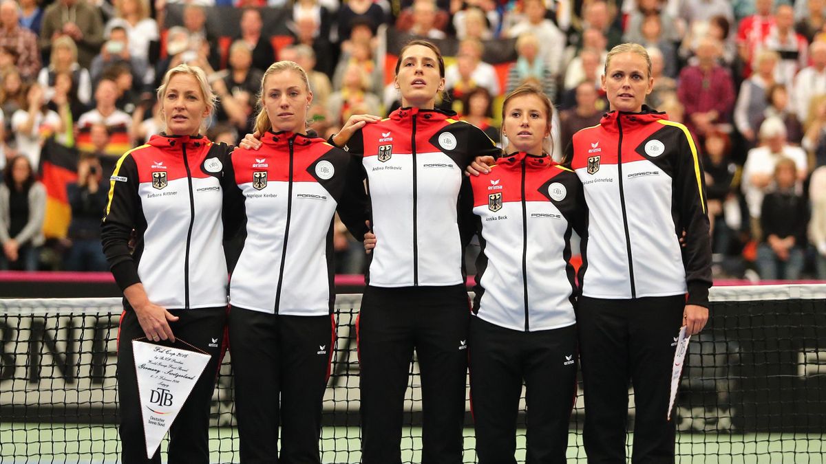 Germany's Fed Cup tennis team (L-R) Barbara Rittner (captain), Angelique Kerber, Andrea Petkovic, Annika Beck and Anna-Lena Groenefeld pose prior to the match between Germany and Switzerland on February 6, 2016, in Leipzig, eastern Germany.
