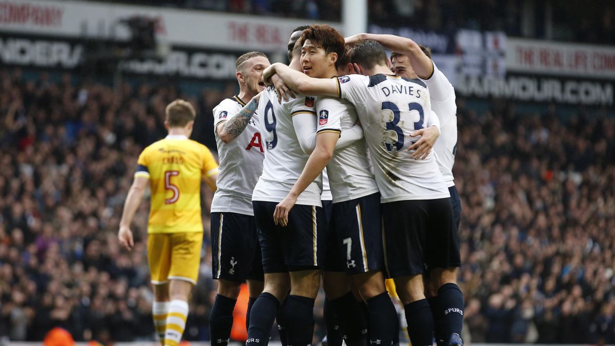 Tottenham's Vincent Janssen celebrates scoring their fifth goal with team mates