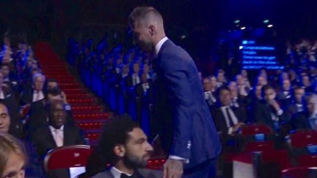 WATCH: Ramos touches Salah on THAT shoulder... fans get ...