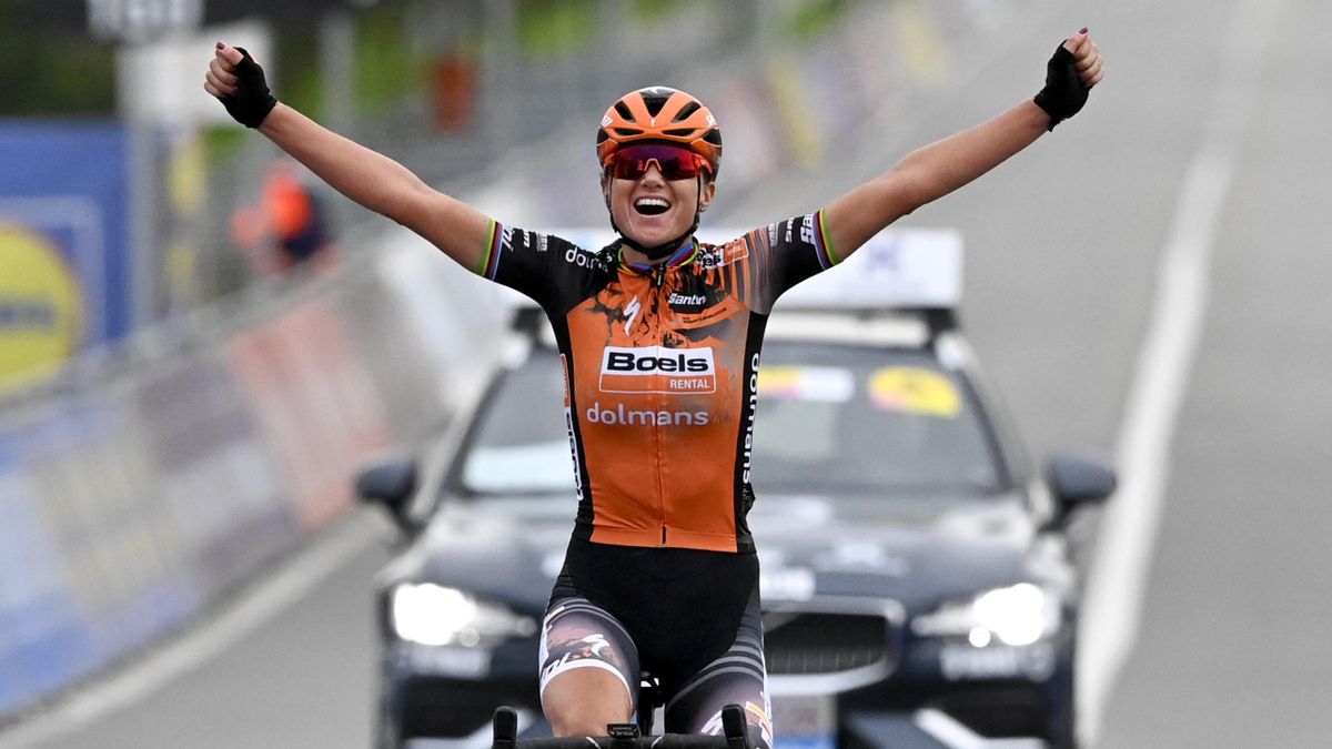 Chantal Van den Broek-Blaak celebrates as she crosses the finish