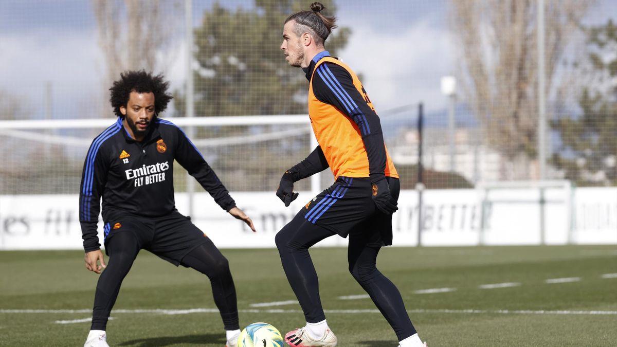 Gareth Bale and Marcelo Silva both of Real Madrid during training at Valdebebas training ground on December 10, 2021 in Madrid, Spain.