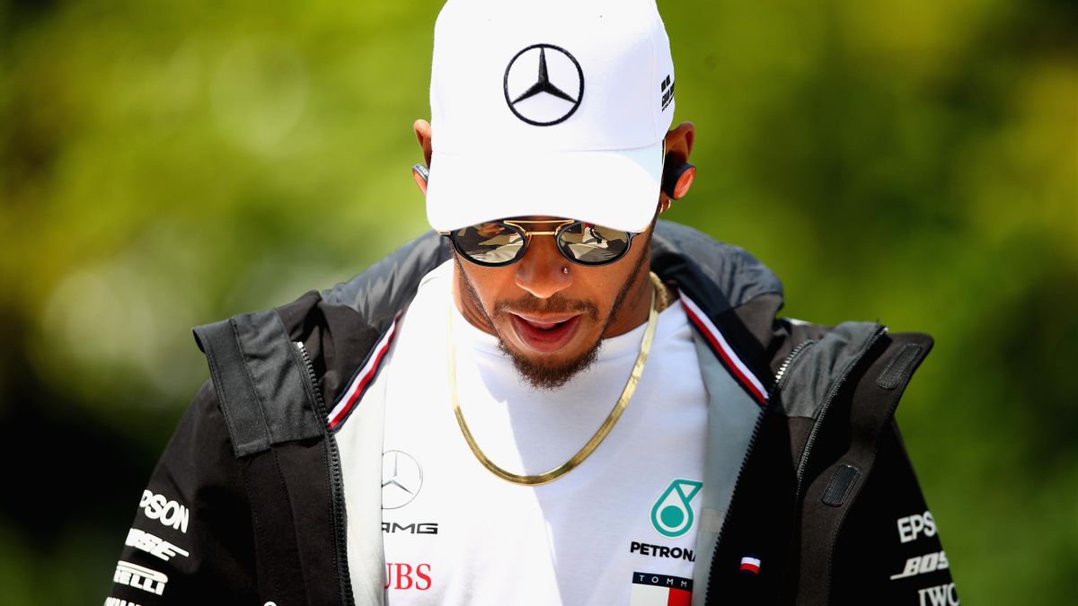 Lewis Hamilton of Great Britain and Mercedes GP walks in the Paddock before the Formula One Grand Prix of China at Shanghai International Circuit on April 15, 2018 in Shanghai, China.