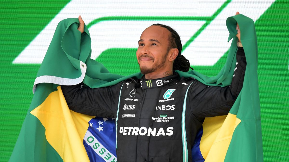 Mercedes' British driver Lewis Hamilton celebrates
