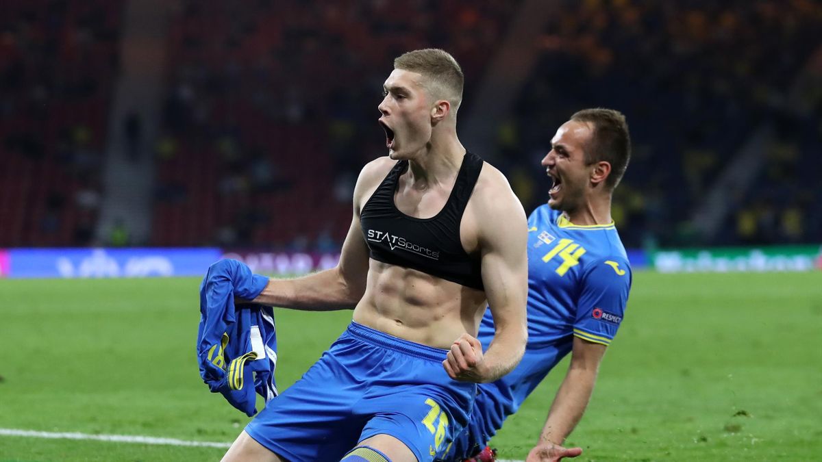Artem Dovbyk of Ukraine celebrates with Yevhen Makarenko after scoring their side's second goal during the UEFA Euro 2020 Championship Round of 16 match between Sweden and Ukraine at Hampden Park on June 29, 2021 in Glasgow, Scotland.