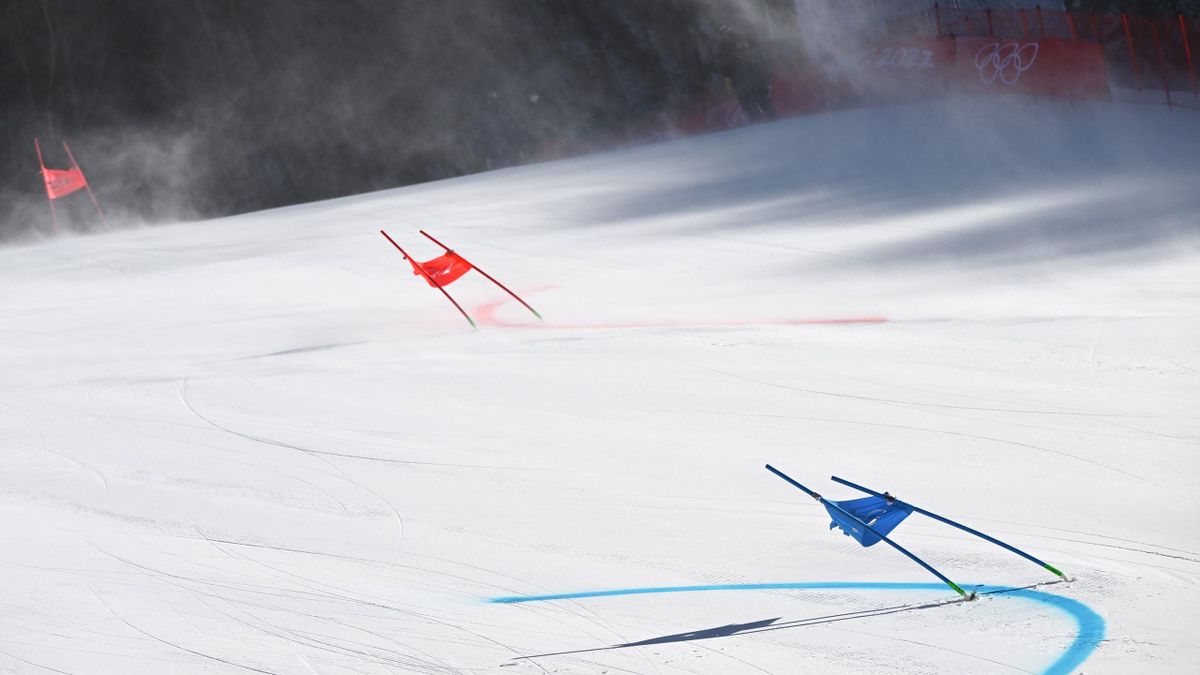Gates bend due to strong winds before the mixed team parallel round of 16 event during the Beijing 2022 Winter Olympic Games at the Yanqing National Alpine Skiing Centre in Yanqing on February 19, 2022