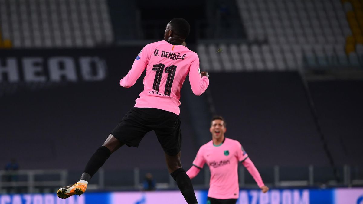 Barcelona's French forward Ousmane Dembele celebrates scoring his team's first goal during the UEFA Champions League Group G football match between Juventus and Barcelona on October 28, 2020 at the Juventus stadium in Turin.