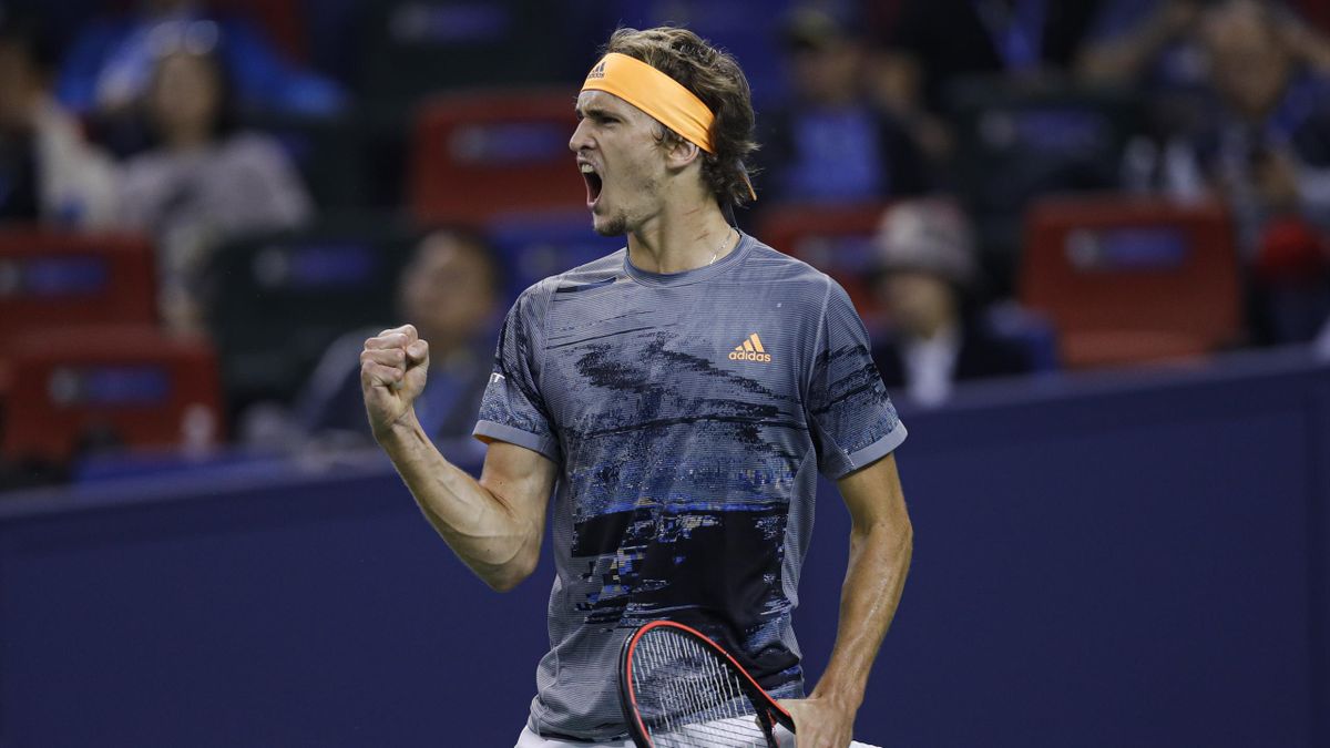 Alexander Zverev of Germany in action against Roger Federer of Switzerland during the Men's singles Quarterfinals match of 2019 Rolex Shanghai Masters day seven at Qi Zhong Tennis Centre on October 11, 2019 in Shanghai, China