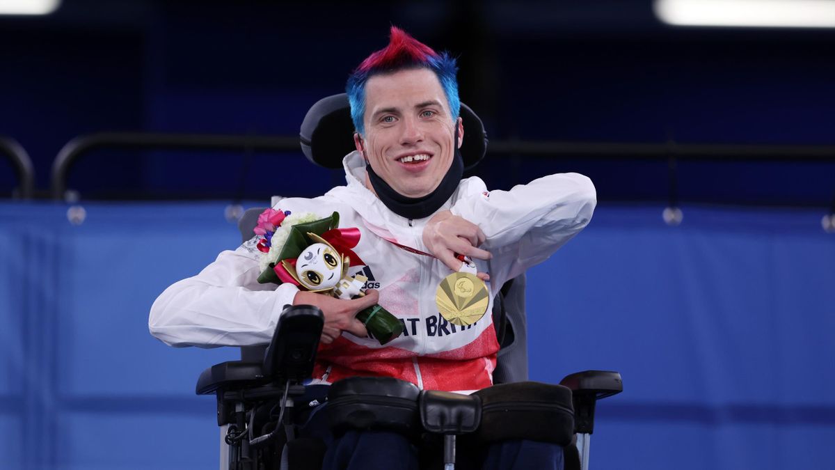Gold medalist David Smith of Team Great Britain celebrates on the podium at the medal ceremony for Boccia Individual - BC1 on day 8 of the Tokyo 2020 Paralympic Games at Ariake Gymnastics Centre