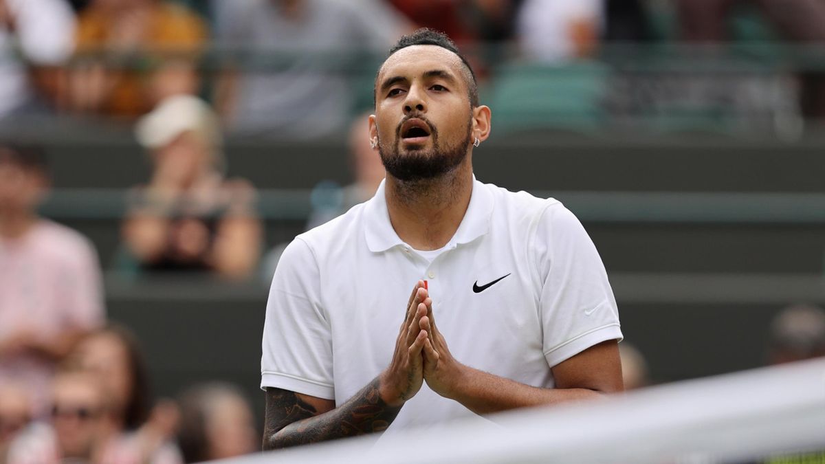 Nick Kyrgios of Australia interacts with the crowd after retiring injured during his men's singles third round match against Felix Auger Aliassime