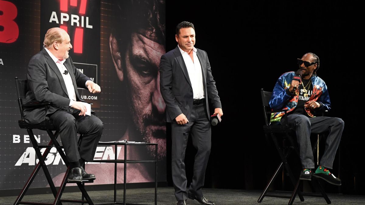Announcer Al Bernstein, Golden Boy Promotions Chairman and CEO Oscar De La Hoya and rapper Snoop Dogg speak onstage during a news conference for Triller Fight Club's inaugural 2021 boxing event at The Venetian Las Vegas on March 26, 2021 in Las Vegas, Nev