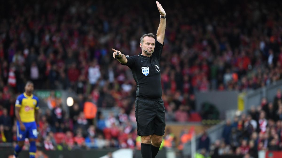 Referee Paul Tierney gestures during the English Premier League football match between Liverpool and Southampton at Anfield in Liverpool, north west England on September 22, 2018