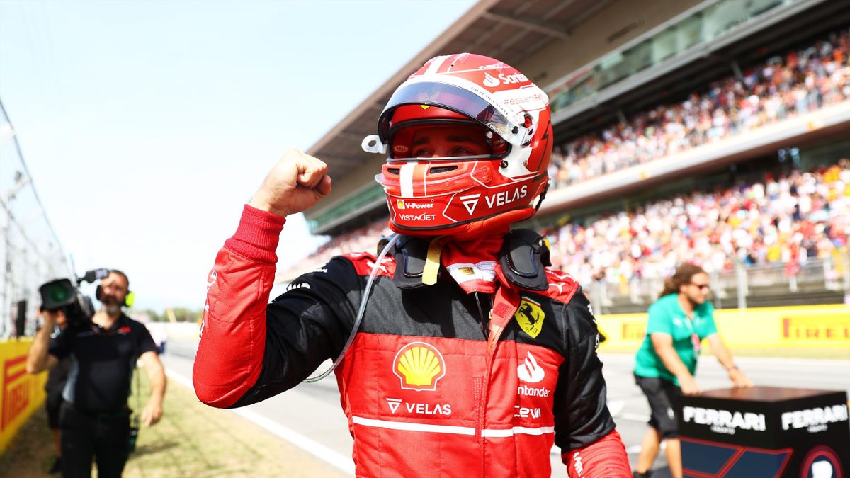 : Pole position qualifier Charles Leclerc of Monaco and Ferrari celebrates in parc ferme during qualifying ahead of the F1 Grand Prix of Spain at Circuit de Barcelona-Catalunya on May 21, 2022 in Barcelona, Spain