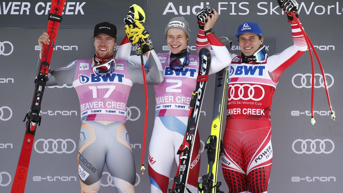 Le podium du Super-G de Beaver Creek entre trois des candidats au gros globe : le Suisse Marco Odermatt leader (au centre) et ses deux poursuivants, le Norvégien Aleksander Aamodt Kilde (à gauche) et l'Autrichien Matthias Mayer (à droite)