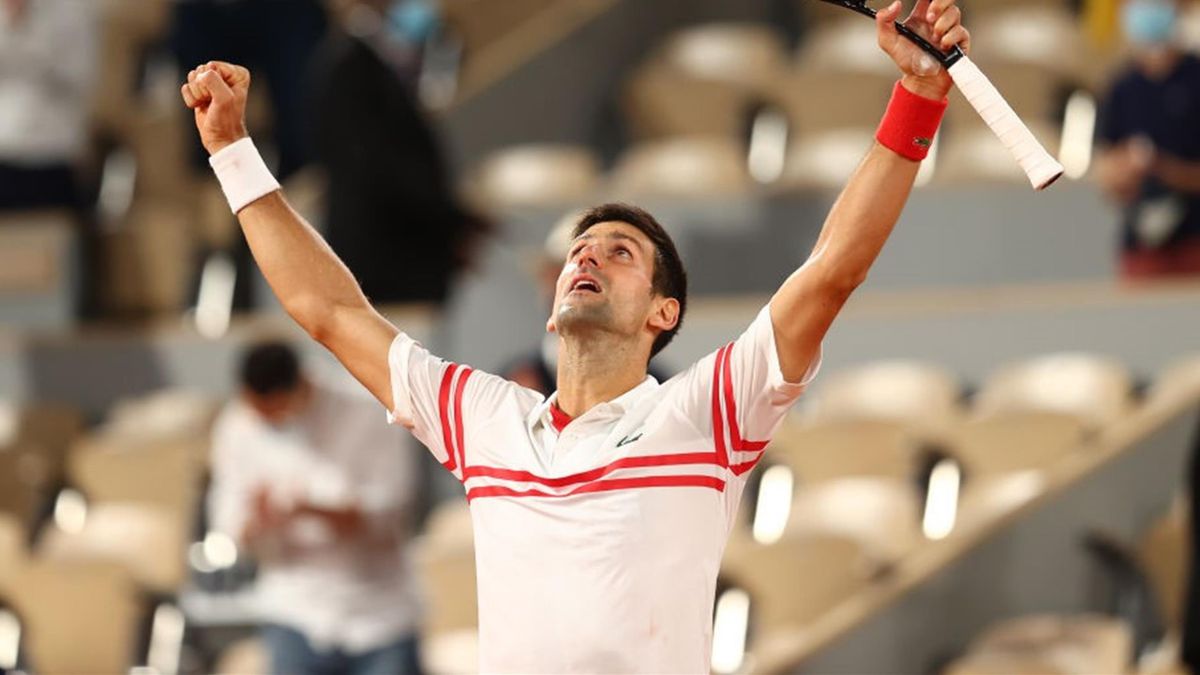 Serbia's Novak Djokovic celebrates after winning against Spain's Rafael Nadal at the end of their men's singles semi-final tennis match on Day 13 of The Roland Garros 2021 French Open tennis tournament in Paris on June 11, 2021