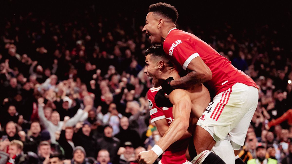Jesse Lingard and Cristiano Ronaldo celebrate Manchester United's winner against Villarreal in the Champions League.
