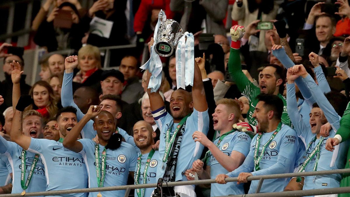 Manchester City dismantle Arsenal to win first silverware ...