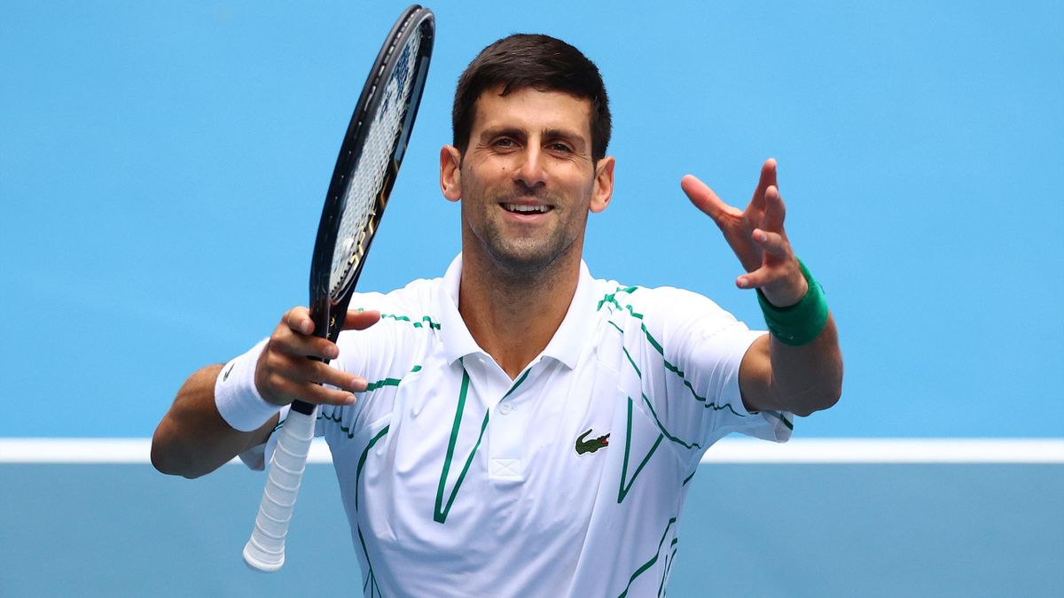 Serbia's Novak Djokovic celebrates after victory against Japan's Tatsuma Ito during their men's singles match on day three of the Australian Open tennis tournament in Melbourne on January 22, 2020
